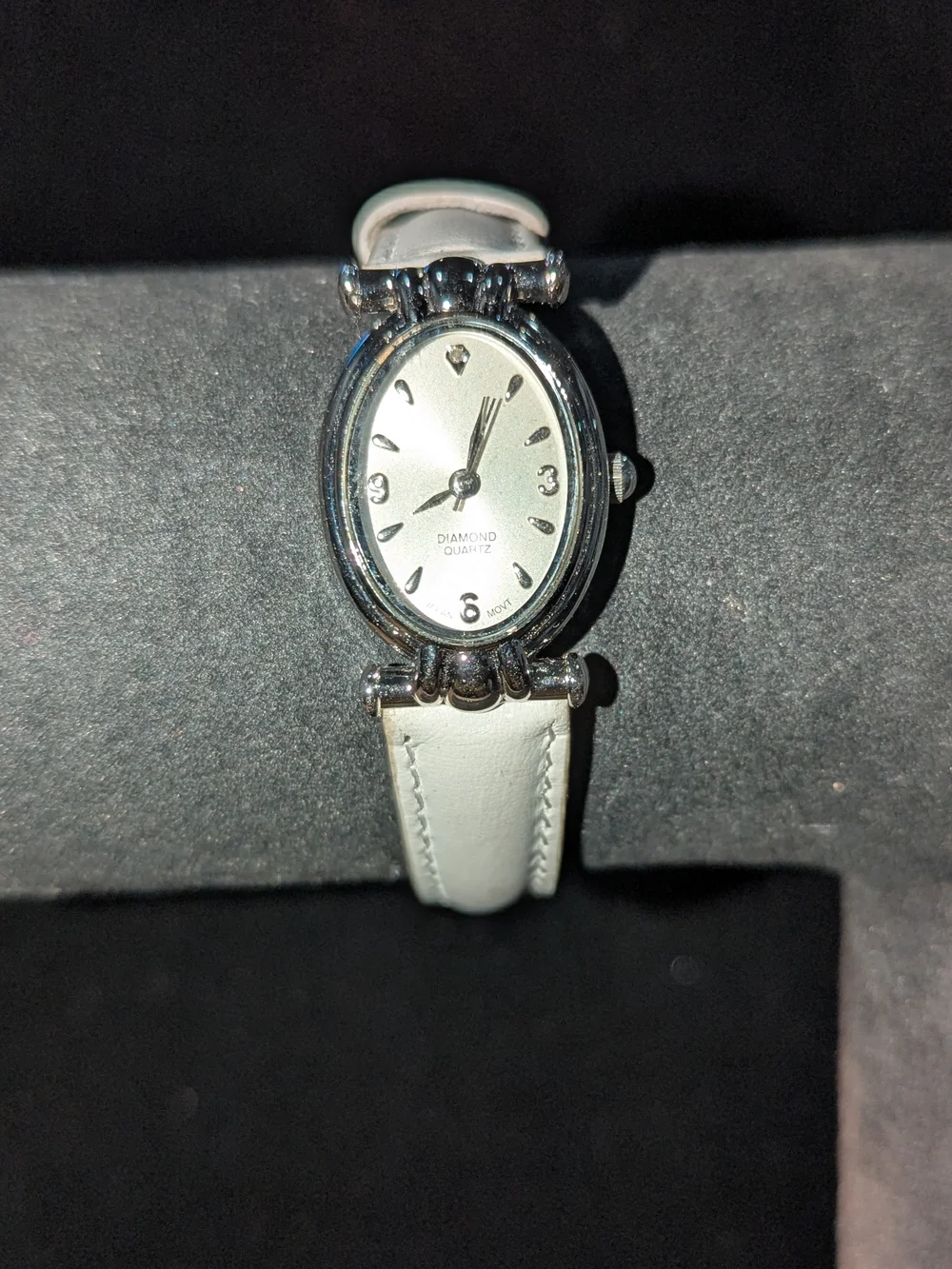 Elegant Oval Diamond Quartz Watch in Ivory and Silver